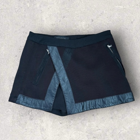 Dance and Marvel black leather and mesh mini skort. - Picture 1 of 2